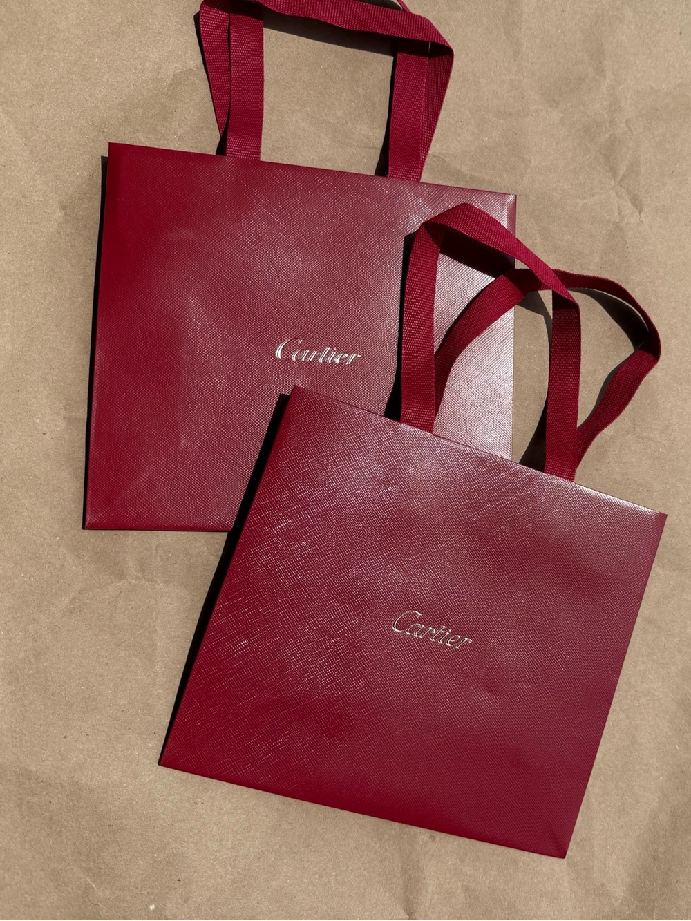 Cartier Burgundy Bags